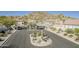 Gated community entrance with desert landscaping and mountain backdrop offering privacy and security at 6334 E Viewmont Dr # 29, Mesa, AZ 85215