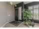 Inviting entryway featuring neutral walls, tile flooring, and a decorative potted plant at 6334 E Viewmont Dr # 29, Mesa, AZ 85215