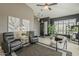 Spacious sitting room with decorative pendant lighting, tiled floors and comfortable seating at 6334 E Viewmont Dr # 29, Mesa, AZ 85215