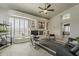 Bright living room boasts fireplace, large windows, and open layout with tiled flooring at 6334 E Viewmont Dr # 29, Mesa, AZ 85215