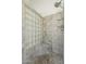Modern shower stall with glass block and tiled walls and floor at 6334 E Viewmont Dr # 29, Mesa, AZ 85215