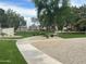 Picturesque neighborhood with tree-lined pathways, green spaces, and well-maintained landscaping, promoting an active lifestyle at 657 N Marble St, Gilbert, AZ 85234