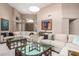 Bright living room with high ceilings, comfortable seating, and elegant decor at 7380 E Turquoise Ave, Scottsdale, AZ 85258