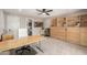 This home office features built-in shelving and a desk at 7642 E Pasadena Ave, Scottsdale, AZ 85250