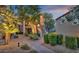 Well-maintained exterior with lush landscaping, creating an inviting approach to the entrance at 7700 E Gainey Ranch Rd # 222, Scottsdale, AZ 85258