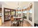 Charming breakfast nook with a round table, natural light, and access to an outdoor patio at 8003 E Sands Dr, Scottsdale, AZ 85255