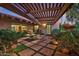 Charming courtyard with a decorative fountain and lush landscaping at 8003 E Sands Dr, Scottsdale, AZ 85255
