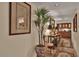 Hallway featuring a tasteful decoration and a view into a living area at 8003 E Sands Dr, Scottsdale, AZ 85255