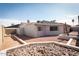 Cozy backyard featuring a rock garden, patio and a storage shed at 8666 E Fillmore St, Scottsdale, AZ 85257