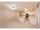 Open-concept living area with sleek flooring, and modern ceiling fan at 8666 E Fillmore St, Scottsdale, AZ 85257