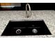 Modern stainless steel faucet and black sink in granite countertop at 10014 N 44Th Dr, Glendale, AZ 85302