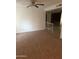 Spacious living room with carpet and ceiling fan at 10014 N 44Th Dr, Glendale, AZ 85302