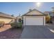 Charming single-Gathering home featuring a one-car garage, well-maintained landscaping and a driveway at 10647 N 63Rd Dr, Glendale, AZ 85304