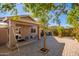 Backyard with brick pavers, privacy wall and covered patio at 11226 W Glenrosa Ave, Phoenix, AZ 85037