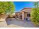 Backyard with brick pavers, privacy wall and covered patio at 11226 W Glenrosa Ave, Phoenix, AZ 85037