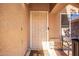 Close-up of the front door, featuring a security screen, and a welcoming entrance to the home at 11226 W Glenrosa Ave, Phoenix, AZ 85037