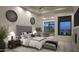 Serene main bedroom with a tufted headboard, a fireplace, and scenic outdoor views at 11520 E Dreyfus Ave, Scottsdale, AZ 85259