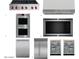 High-end kitchen appliances by Wolf, including a range, oven, microwave, and refrigerator at 12326 E Black Rock Rd, Scottsdale, AZ 85255