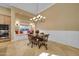 Bright kitchen breakfast nook featuring bench seating, tile floors, and natural lighting at 1708 W Gambit Trl, Phoenix, AZ 85085