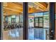 Bright, modern gym featuring rows of stationary bikes with large windows offering scenic views of the desert landscape at 1708 W Gambit Trl, Phoenix, AZ 85085