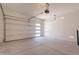 Well-lit garage with modern door and ample space for vehicles and storage at 17966 W Long Lake Rd, Goodyear, AZ 85338
