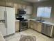 Kitchen featuring stainless steel appliances and ample counter space at 18239 N 40Th St # 115, Phoenix, AZ 85032