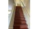 Stairway with wood-look flooring leading to the second floor at 18239 N 40Th St # 115, Phoenix, AZ 85032