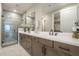 Spa-like bathroom with a double vanity, large mirror, and a glass-enclosed shower at 2121 W Sonoran Desert Dr # 95, Phoenix, AZ 85085