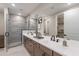 Modern bathroom features double vanity, a glass-enclosed shower, and contemporary fixtures at 2121 W Sonoran Desert Dr # 95, Phoenix, AZ 85085
