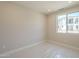 Bright bedroom with large windows, carpet flooring and modern lighting fixtures at 2121 W Sonoran Desert Dr # 95, Phoenix, AZ 85085