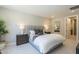 Cozy bedroom with plush carpeting, neutral paint, and a large window for natural light at 2121 W Sonoran Desert Dr # 95, Phoenix, AZ 85085
