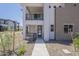Modern two-story home features a balcony, black trim windows, and low maintenance desert landscaping at 2121 W Sonoran Desert Dr # 95, Phoenix, AZ 85085