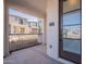 Inviting covered front porch with decorative railing and modern door. Address number prominently displayed at 2121 W Sonoran Desert Dr # 95, Phoenix, AZ 85085