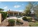 Private backyard oasis with lush landscaping and a tranquil pool at 2534 W Muirfield Dr, Anthem, AZ 85086