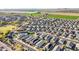 Wide aerial shot of neighborhood near agricultural areas with mountain backdrop at 25634 W Samantha Way, Buckeye, AZ 85326