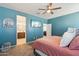 View of primary bedroom and ensuite bathroom at 25634 W Samantha Way, Buckeye, AZ 85326