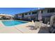 Community pool and lounge area, ideal for relaxation and enjoying sunny days at 2616 W Berridge Ln # C2, Phoenix, AZ 85017