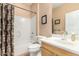 Standard bathroom with a single sink and bathtub with shower combination at 26237 W Vista North Dr, Buckeye, AZ 85396