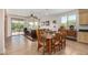 Dining area with natural light, a view of the backyard, and access to the kitchen at 26237 W Vista North Dr, Buckeye, AZ 85396