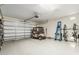 Spacious three car garage featuring epoxy flooring and insulated garage doors at 26237 W Vista North Dr, Buckeye, AZ 85396