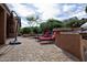 Enjoy backyard entertaining with this outdoor kitchen and waterfall while relaxing on the lounge chairs at 26293 W Runion Ln, Buckeye, AZ 85396
