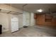 View of garage with storage cabinets and shelving, plus room for parking at 26293 W Runion Ln, Buckeye, AZ 85396