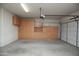 Spacious garage featuring built-in storage cabinets for tools and equipment at 26293 W Runion Ln, Buckeye, AZ 85396