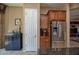 Well-appointed kitchen space featuring custom cabinetry and stainless steel refrigerator at 26293 W Runion Ln, Buckeye, AZ 85396