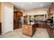 Bright kitchen with stainless steel refrigerator and center island, perfect for entertaining at 26293 W Runion Ln, Buckeye, AZ 85396