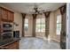 Bright, airy living room filled with natural light from large windows and designer curtains at 26293 W Runion Ln, Buckeye, AZ 85396