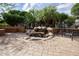 Beautiful private waterfall in this serene backyard creates a relaxing atmosphere at 26293 W Runion Ln, Buckeye, AZ 85396