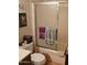 Bathroom featuring a shower with sliding doors and towel rack for convenience at 3160 E Main St # 62, Mesa, AZ 85213