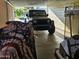 Carport featuring a black Jeep parked inside for convenient covered parking at 3160 E Main St # 62, Mesa, AZ 85213