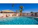 Sparkling community pool with refreshing blue water, surrounded by comfortable lounge seating at 3160 E Main St # 62, Mesa, AZ 85213